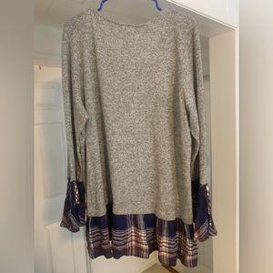 Sweater with shirt look under